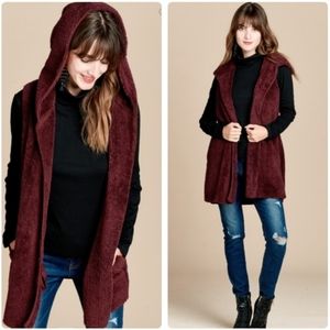 Faux fur sleeveless hooded jacket